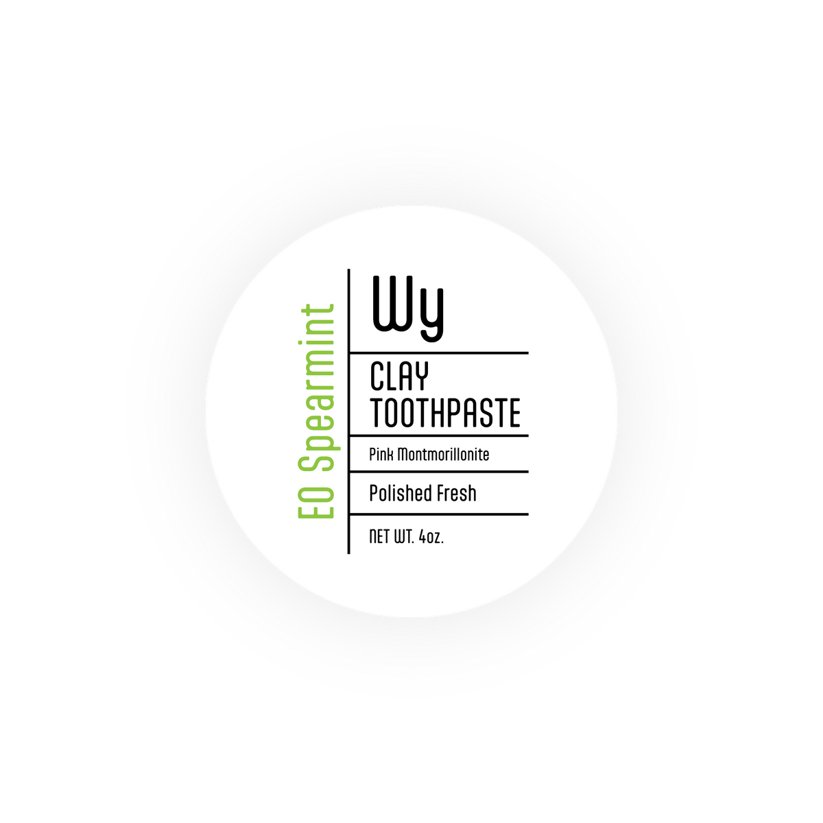 Top view of Wy Clay Toothpaste lid showing EO Spearmint label with Pink Montmorillonite, Polished Fresh, Net Wt. 4oz
